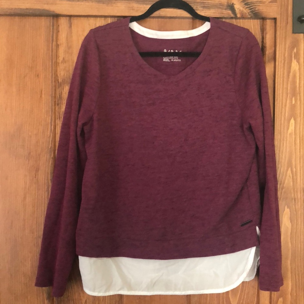 Maroon sweater with white underneath for a layer.